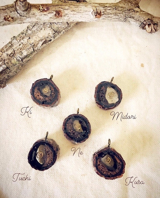 Pendant in rebirth with tree branch