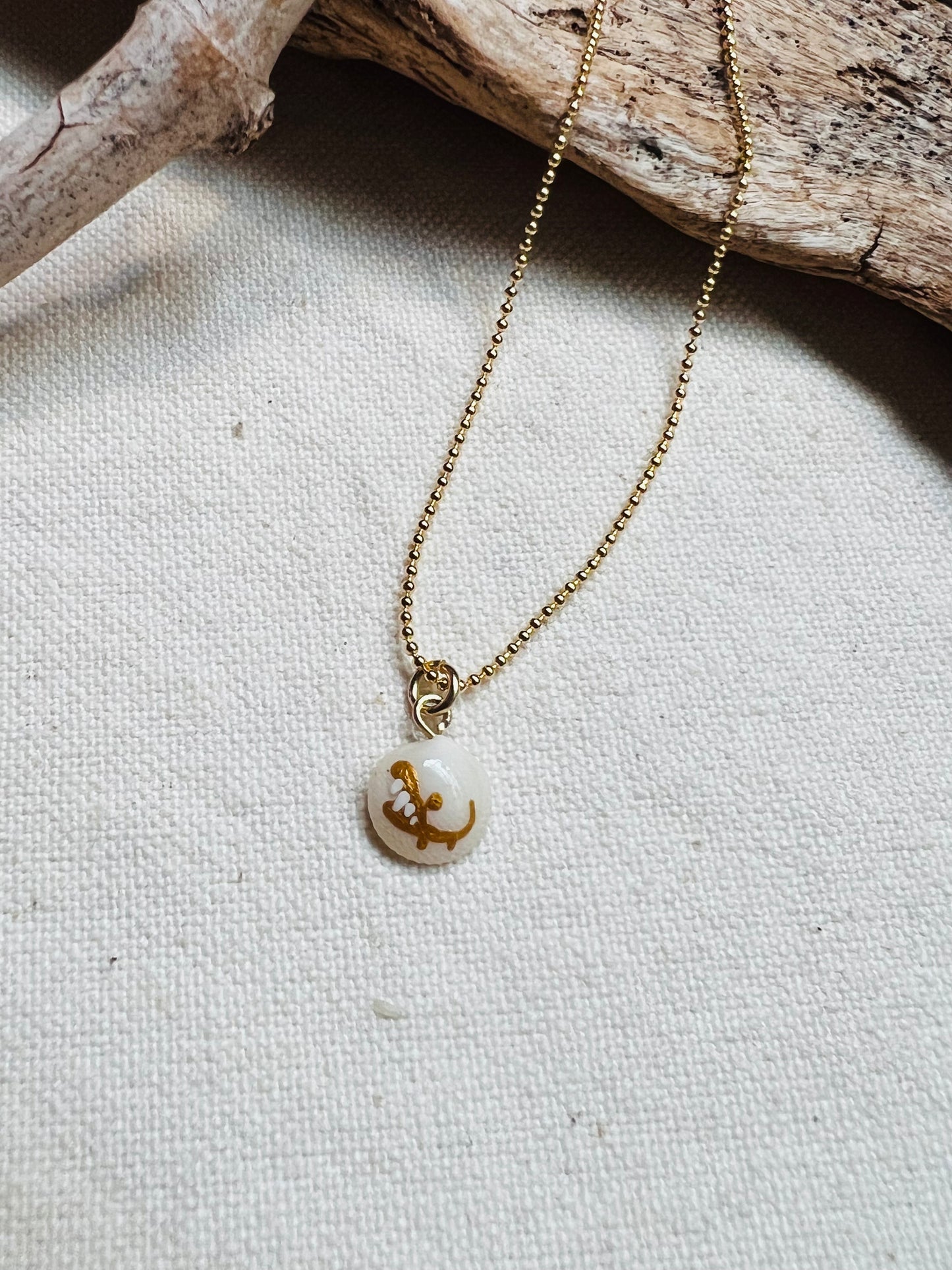 Tiny shell necklace with painting, little crocodile