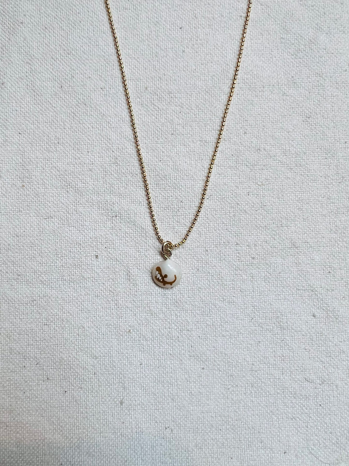 Tiny shell necklace with painting, little crocodile