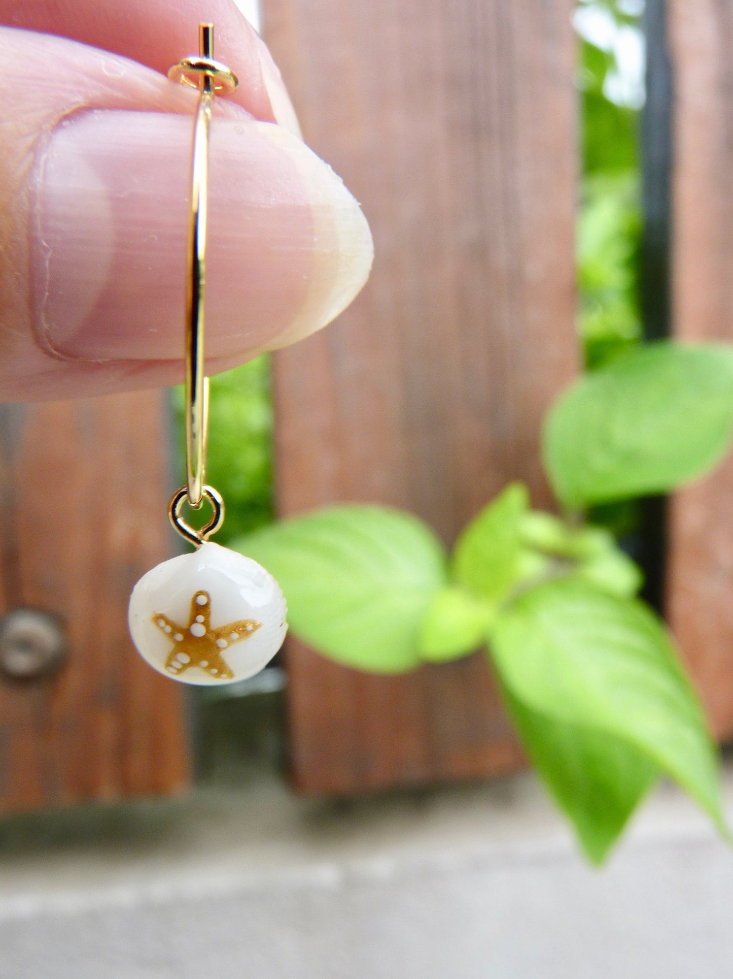 Tiny shell earrings with painting, little fish