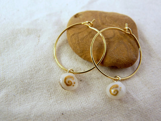 Tiny shell earrings with painting, little swirl