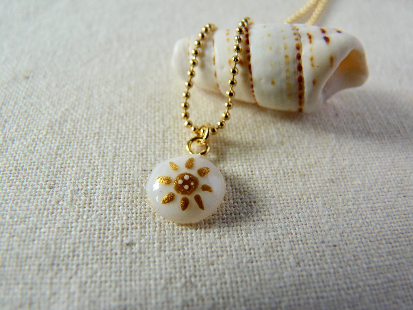 Tiny shell necklace with painting, little sun