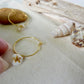 Tiny shell earrings with painting, little swirl