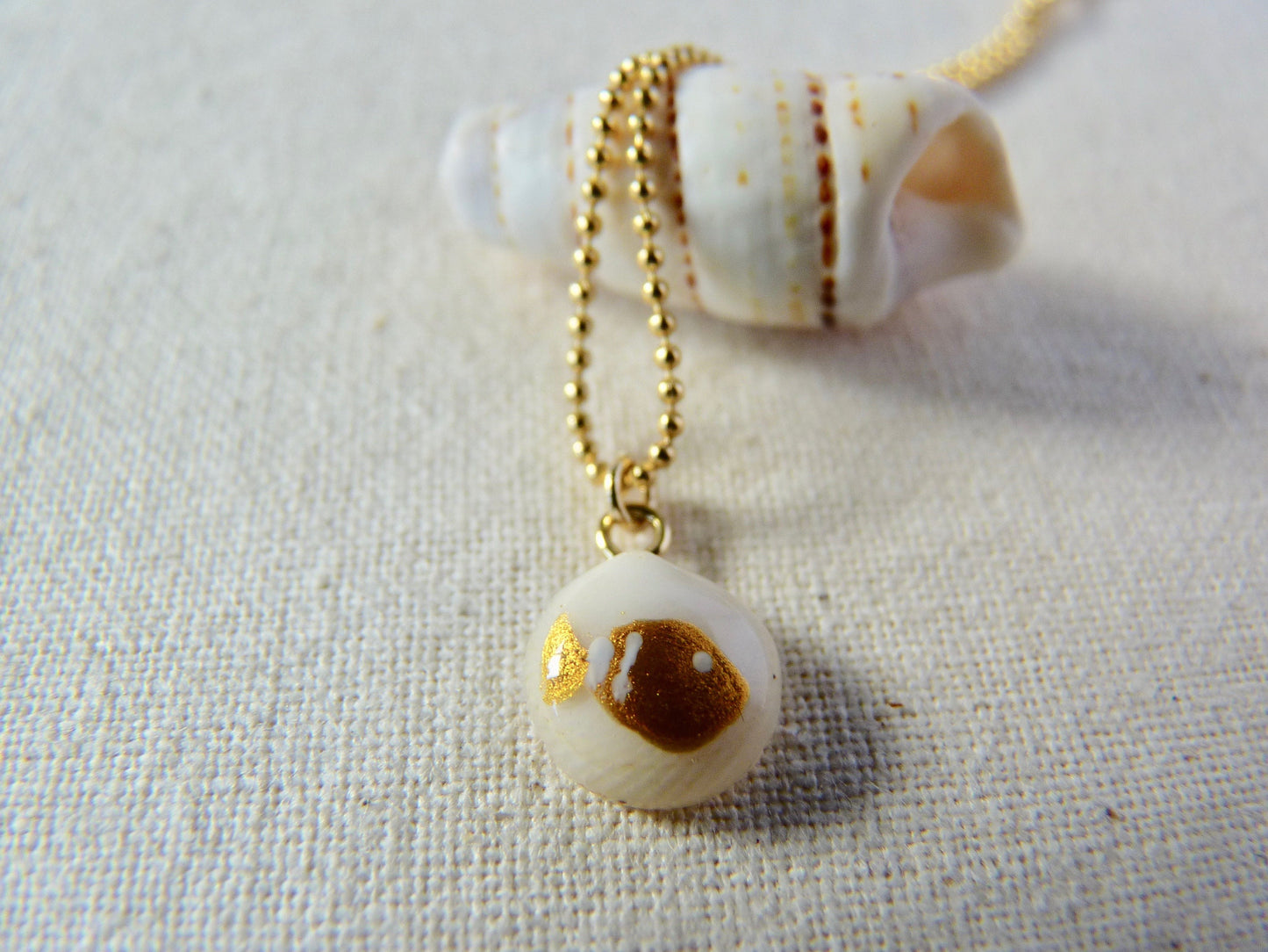 Tiny shell necklace with painting, little fish
