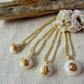 Tiny shell necklace with painting, little swirl