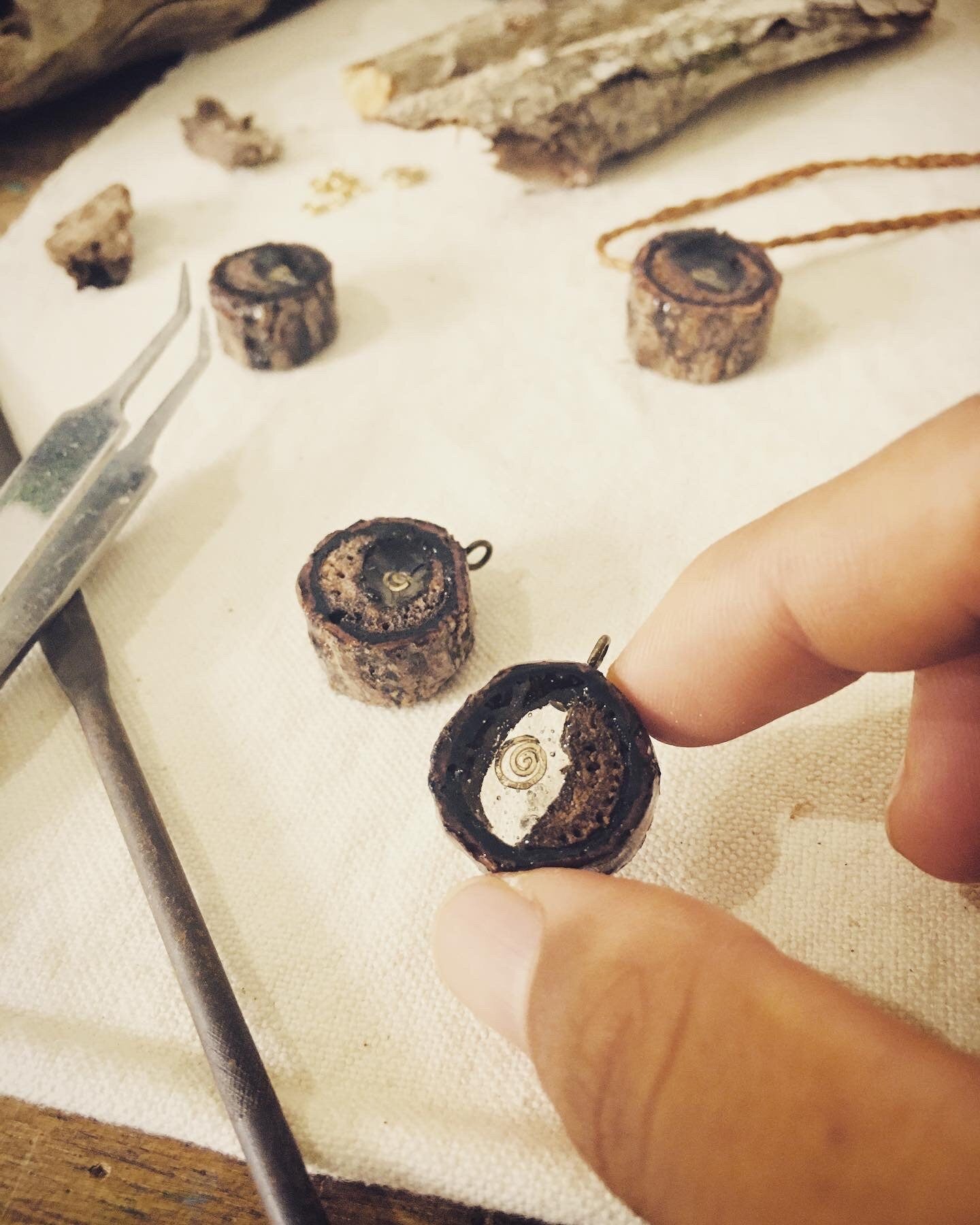 Pendant in rebirth with tree branch