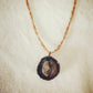 Pendant in rebirth with tree branch