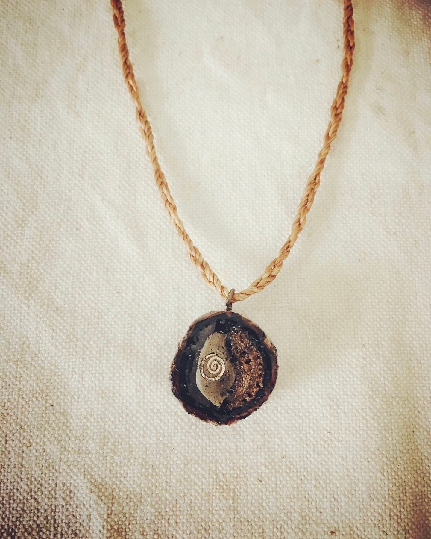 Pendant in rebirth with tree branch