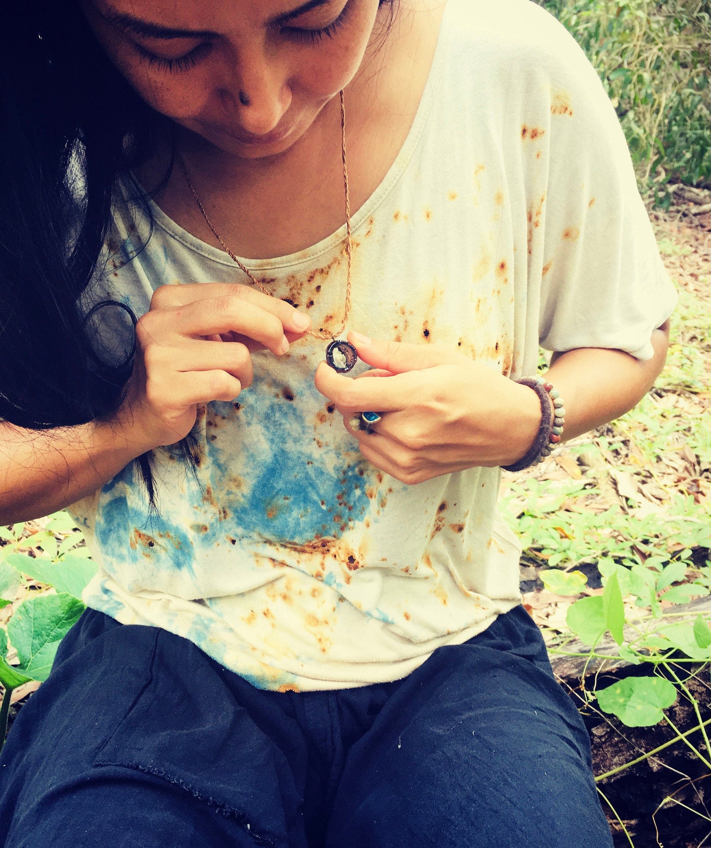 Pendant in rebirth with tree branch