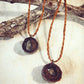 Pendant in rebirth with tree branch