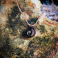 Pendant in rebirth with tree branch