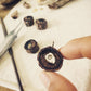 Pendant in rebirth with tree branch