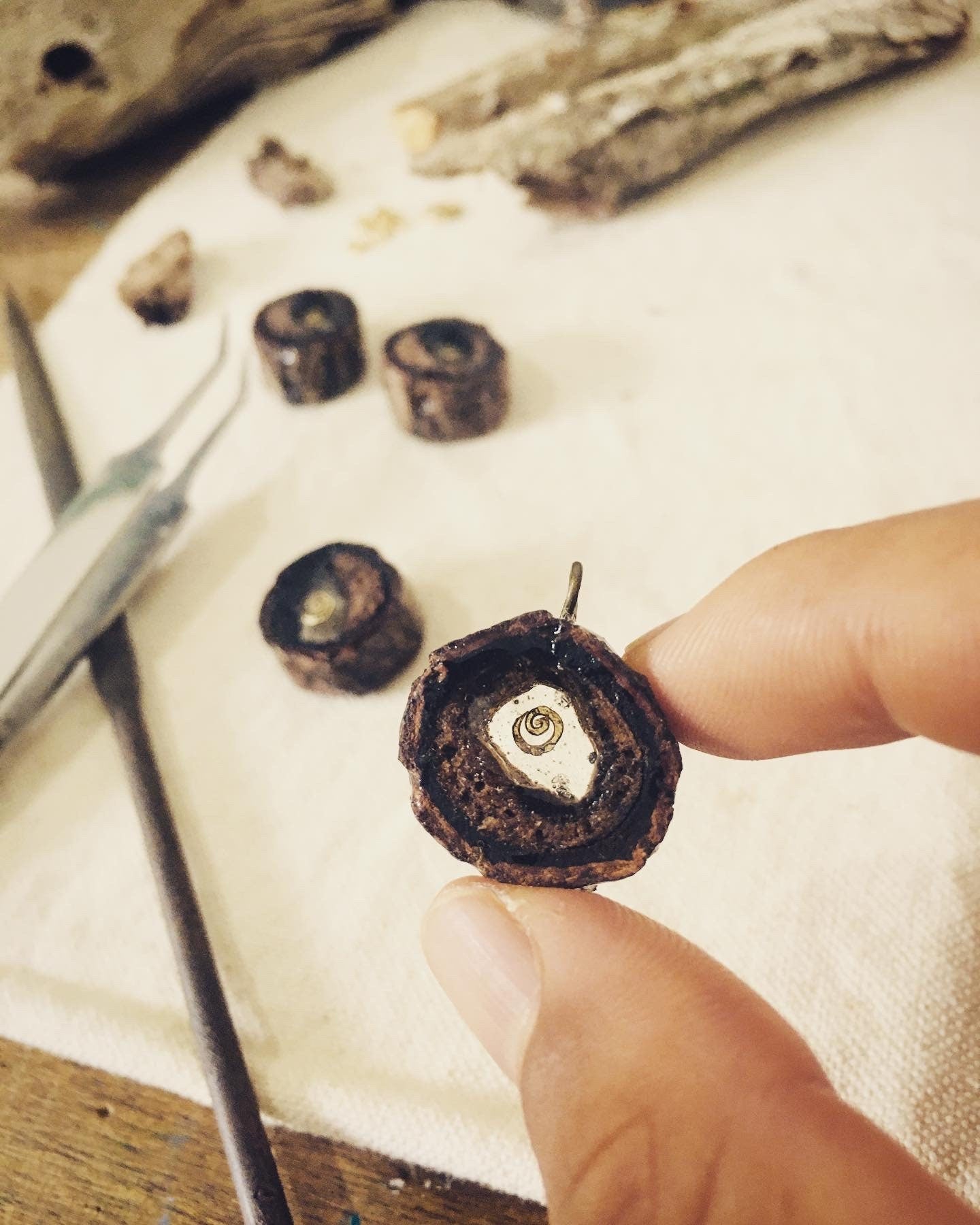 Pendant in rebirth with tree branch