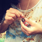 Pendant in rebirth with tree branch
