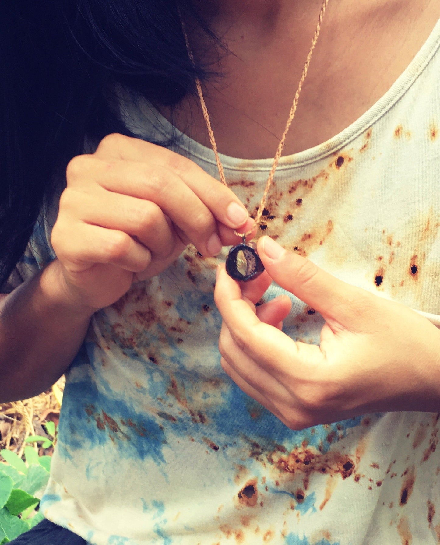 Pendant in rebirth with tree branch